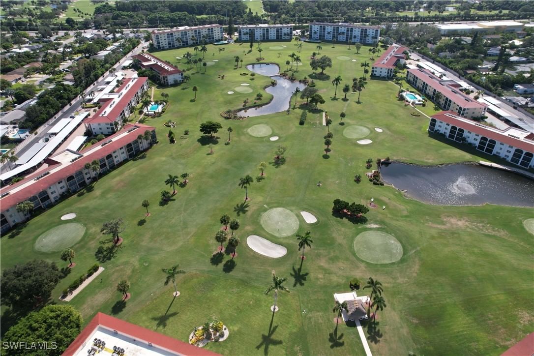 9 High Point Circle N #305, Naples, FL 34103 photo 2