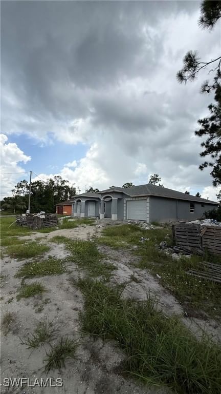 1077 Jaguar Boulevard, Lehigh Acres, FL 33974 photo 2