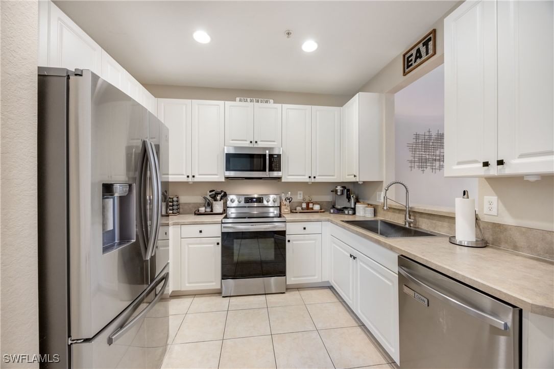 1320 Mariposa Circle #104, Naples, FL 34105 photo 2