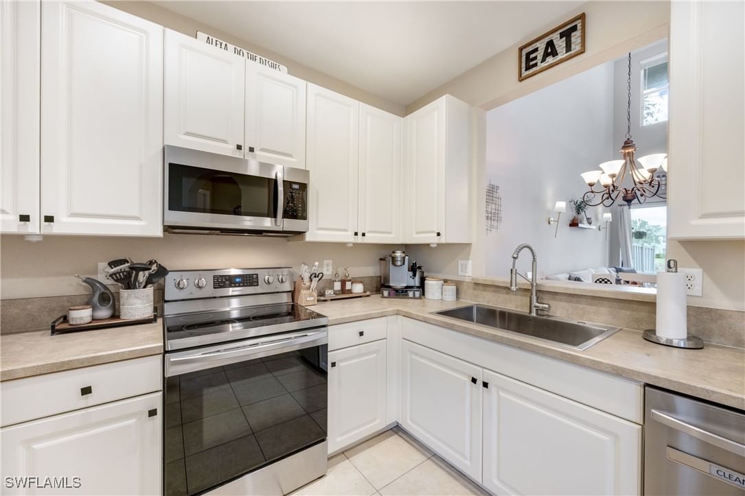 1320 Mariposa Circle #104, Naples, FL 34105 photo 3