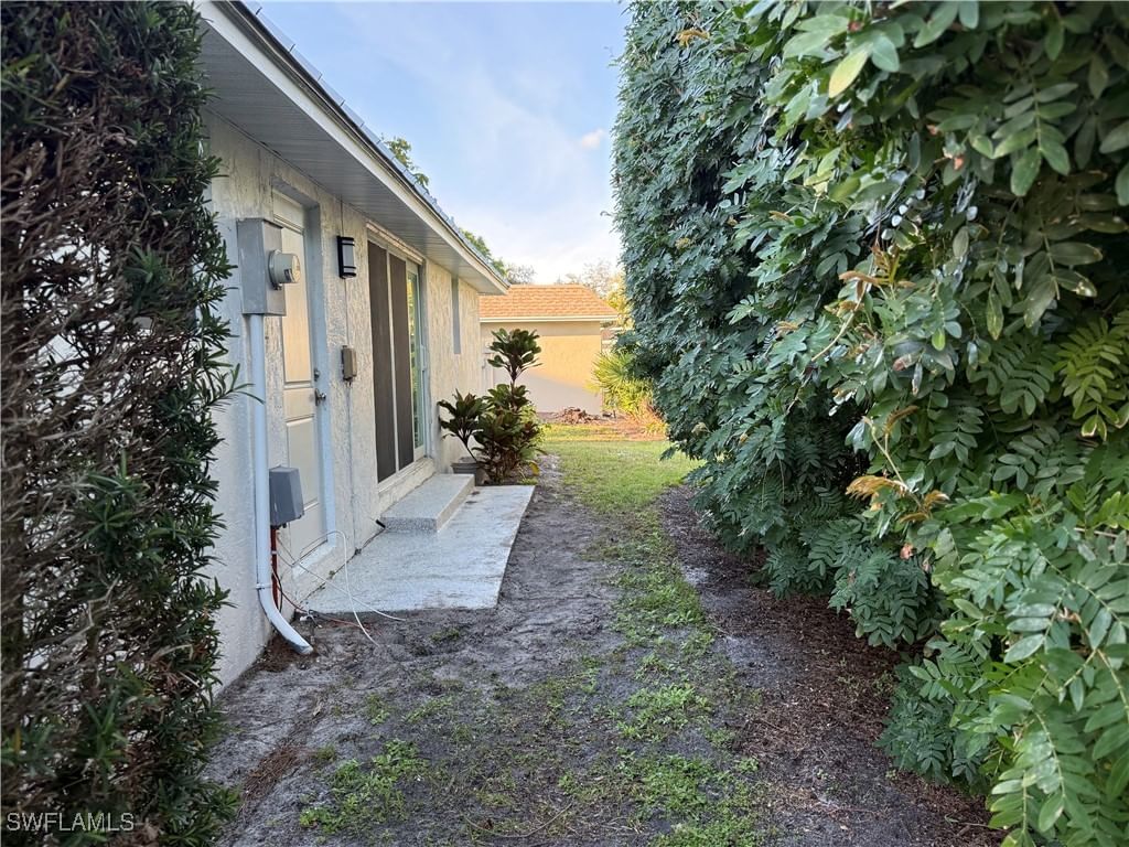 310 Carnaby Court, Naples, FL 34112 photo 3
