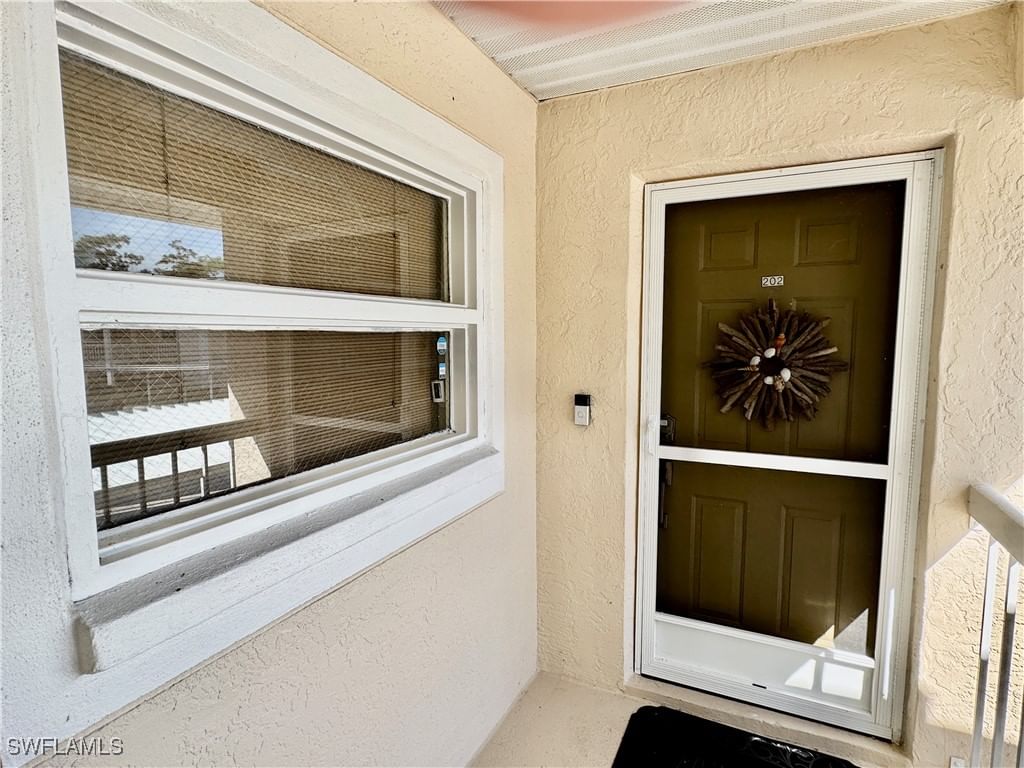 645 Squire Court #202, Naples, FL 34104 photo 2