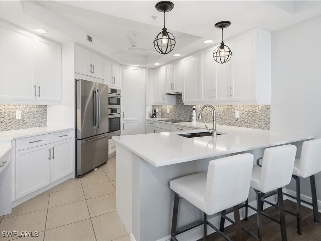 445 Cove Tower Drive #704, Naples, FL 34110 photo 2