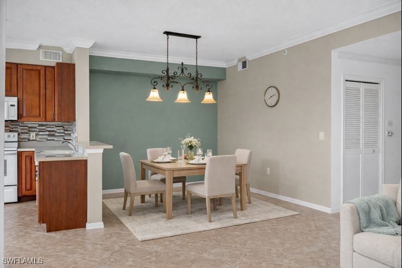 6816 STERLING GREENS Place #303, Naples, FL 34104 photo 2