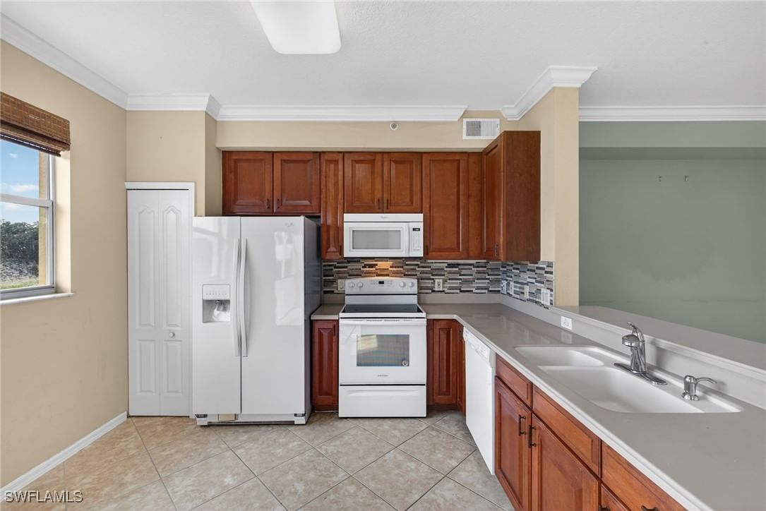 6816 STERLING GREENS Place #303, Naples, FL 34104 photo 4