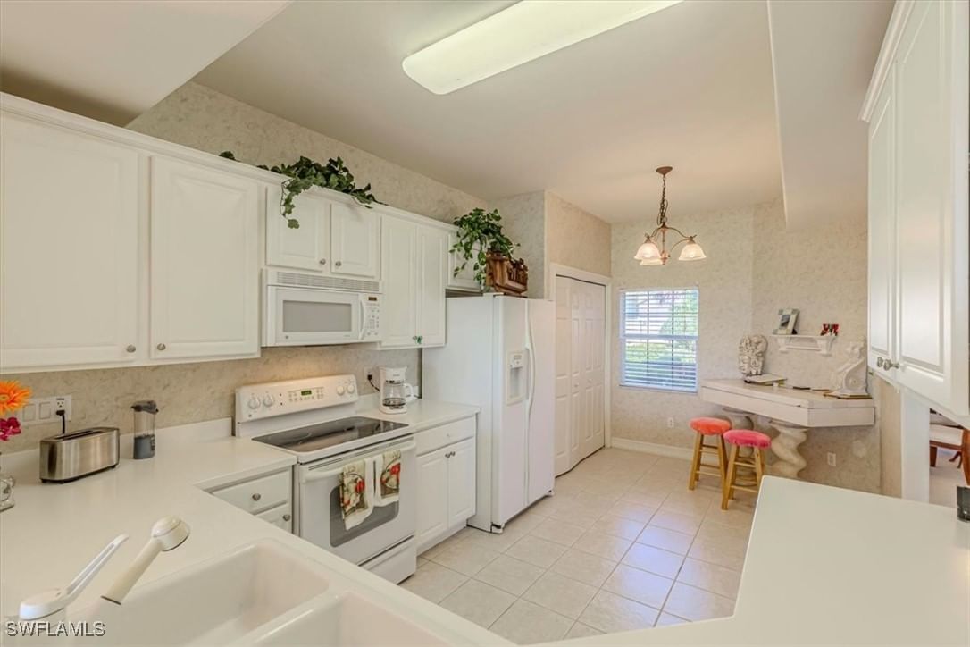 9195 Michael Circle #1303, Naples, FL 34113 photo 2