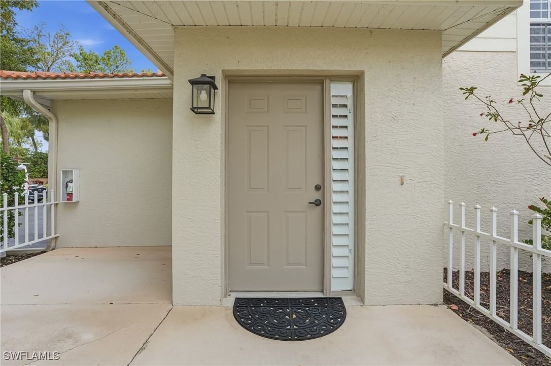 7680 Oleander Gate Drive #J202, Naples, FL 34109 photo 2