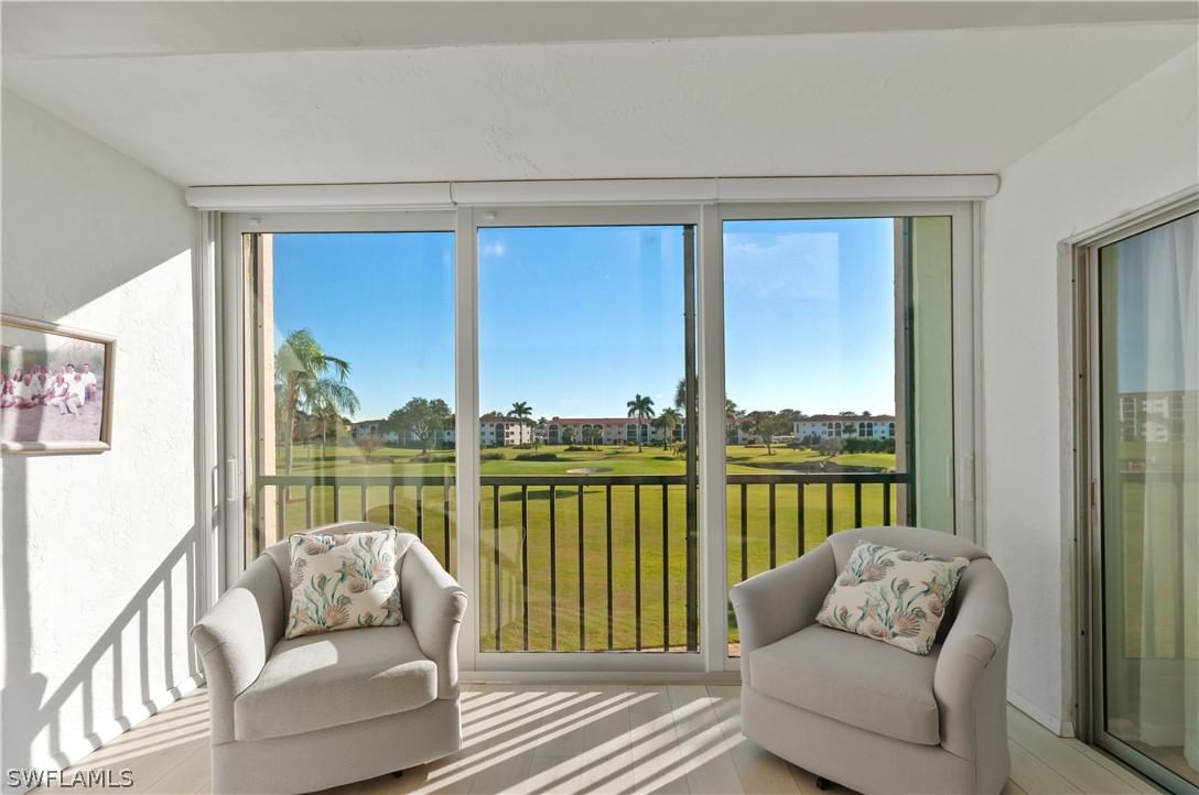 13 High Point Circle N #203, Naples, FL 34103 photo 2