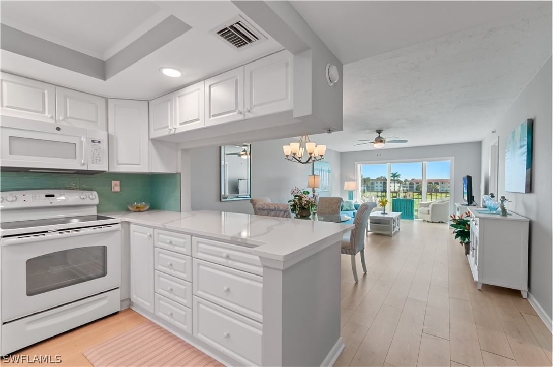 13 High Point Circle N #203, Naples, FL 34103 photo 3