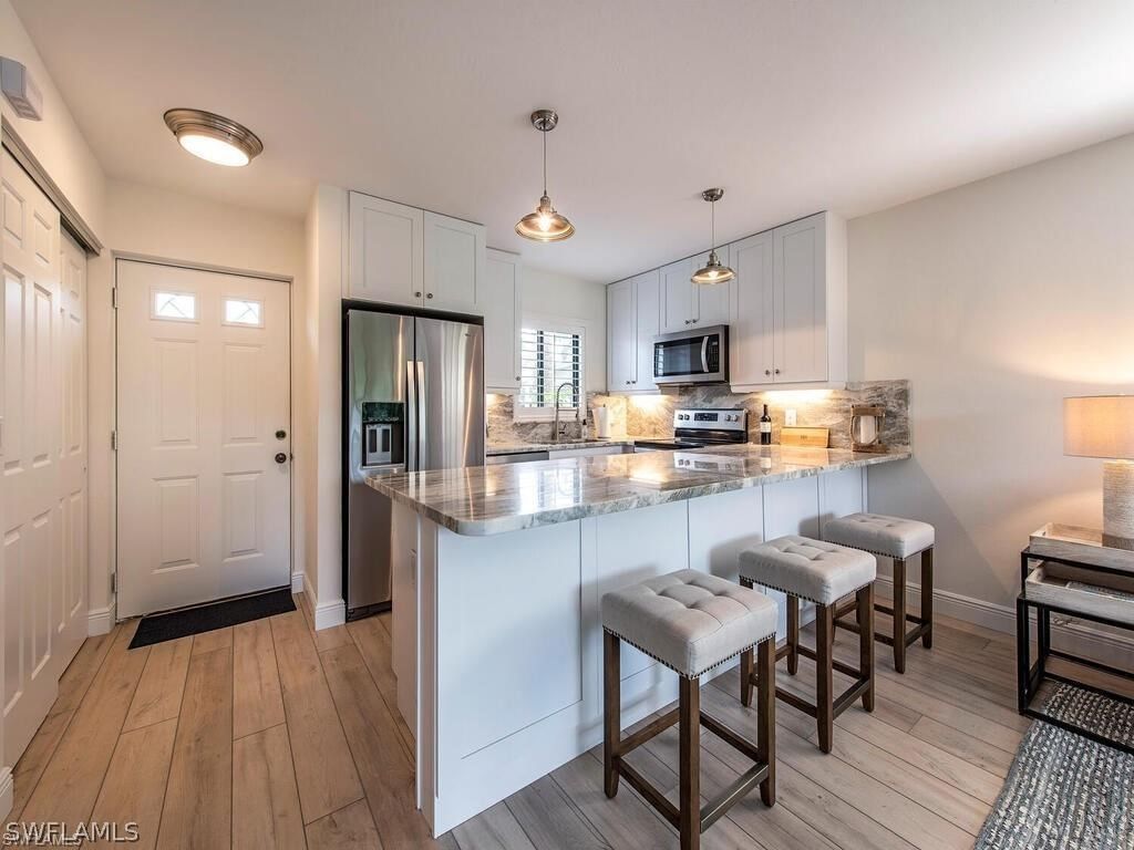 746 Eagle Creek Drive #101, Naples, FL 34113 photo 2