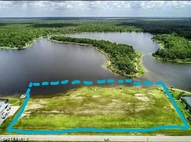 455 Shady Hollow Boulevard W, Naples, FL 34120 photo 2