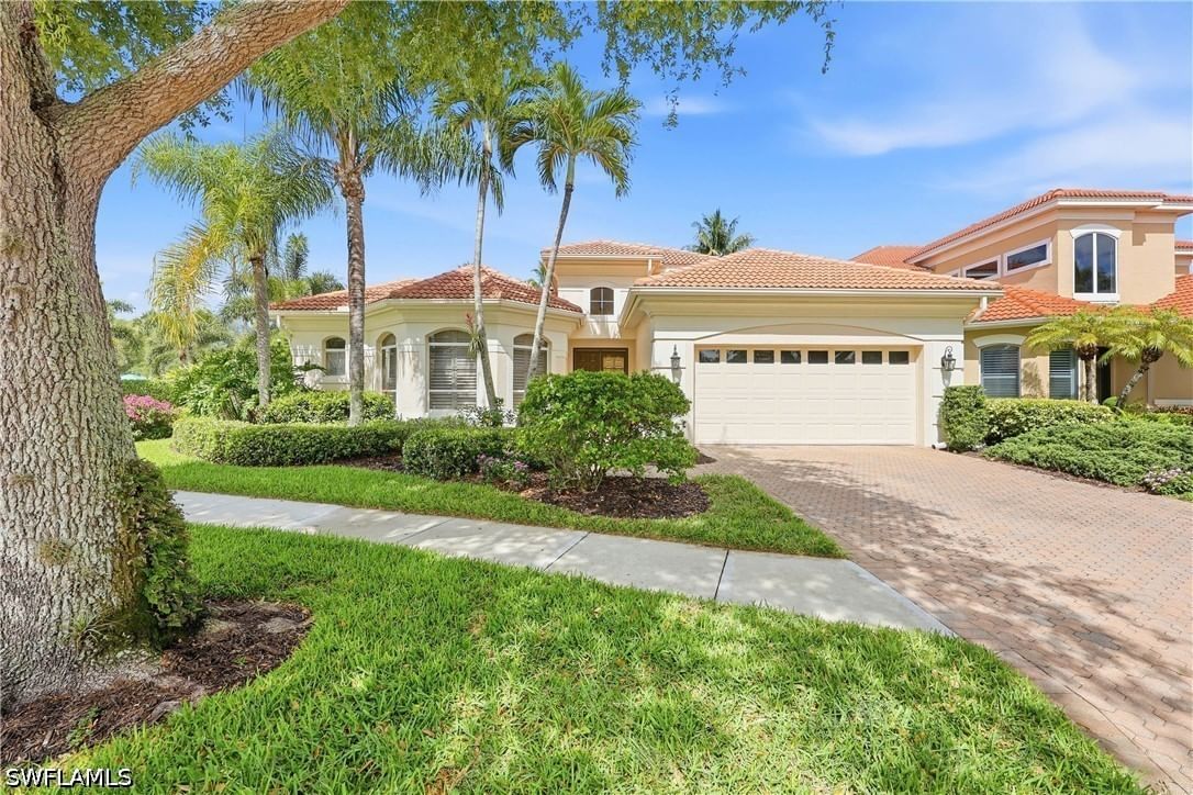 9227 Troon Lakes Drive, Naples, FL 34109 photo 2