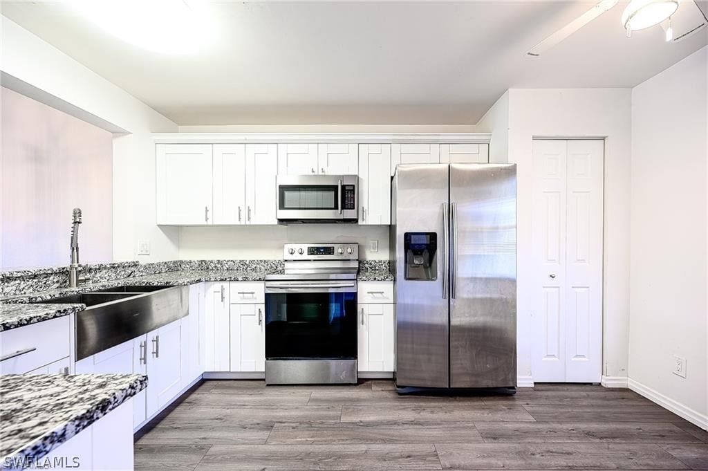1476 Churchill Circle #J-202, Naples, FL 34116 photo 2