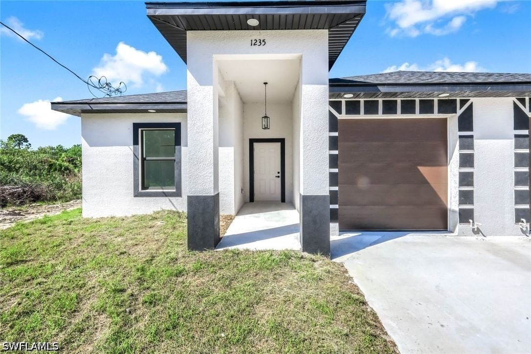 1235/1237 Hillcrest Street E, Lehigh Acres, FL 33974 photo 2