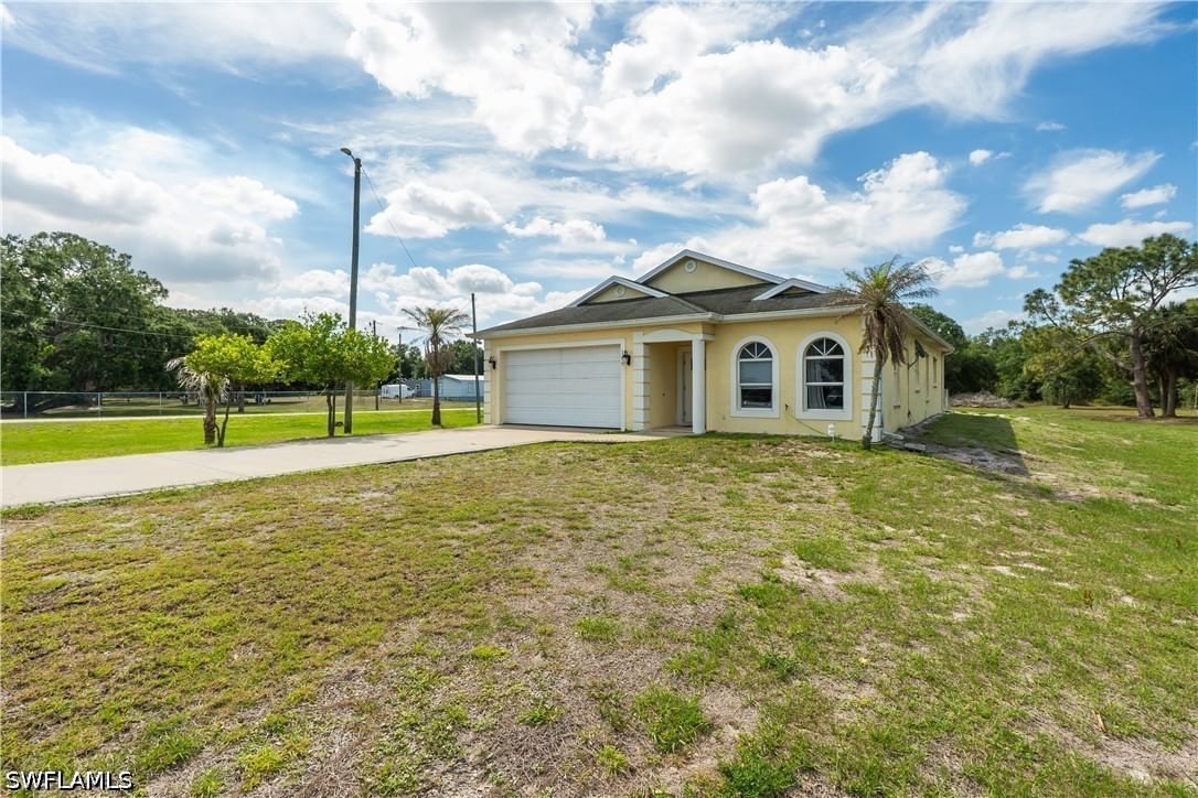 166 Pine Cone Avenue, Montura Ranches, FL 33440 photo 2