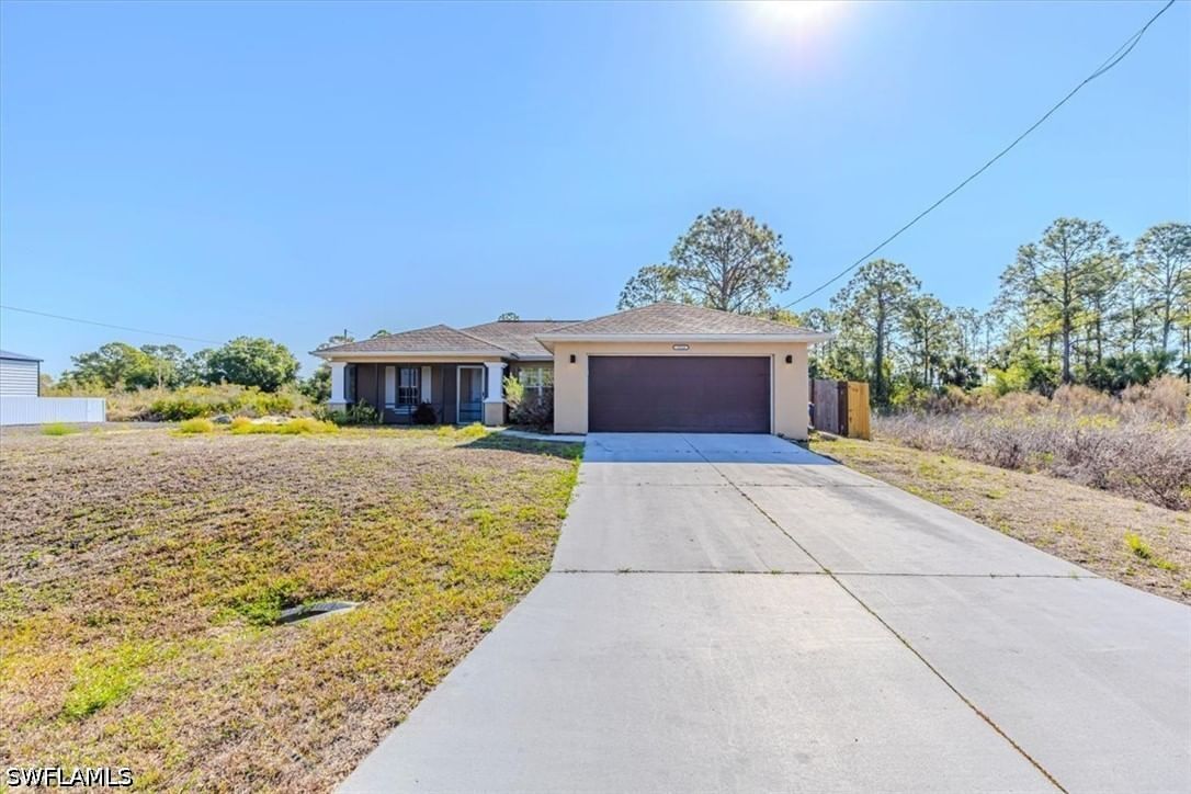 2814 Cerito Avenue N, Lehigh Acres, FL 33971 photo 2