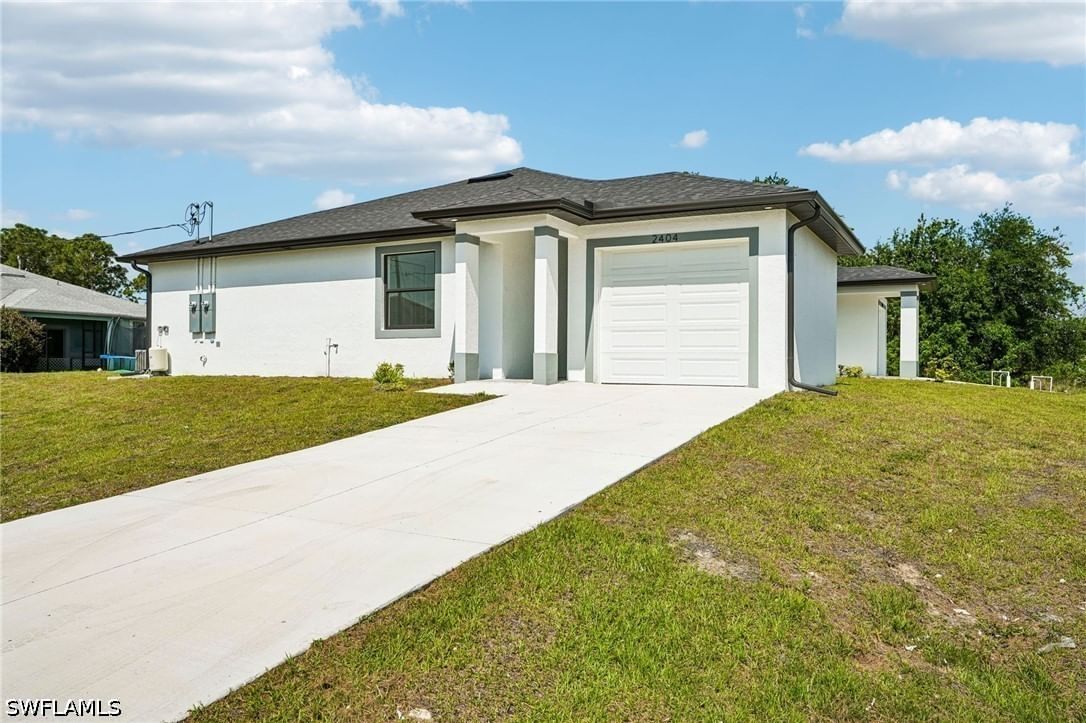 2404-2406 Hightower Avenue S, Lehigh Acres, FL 33973 photo 2