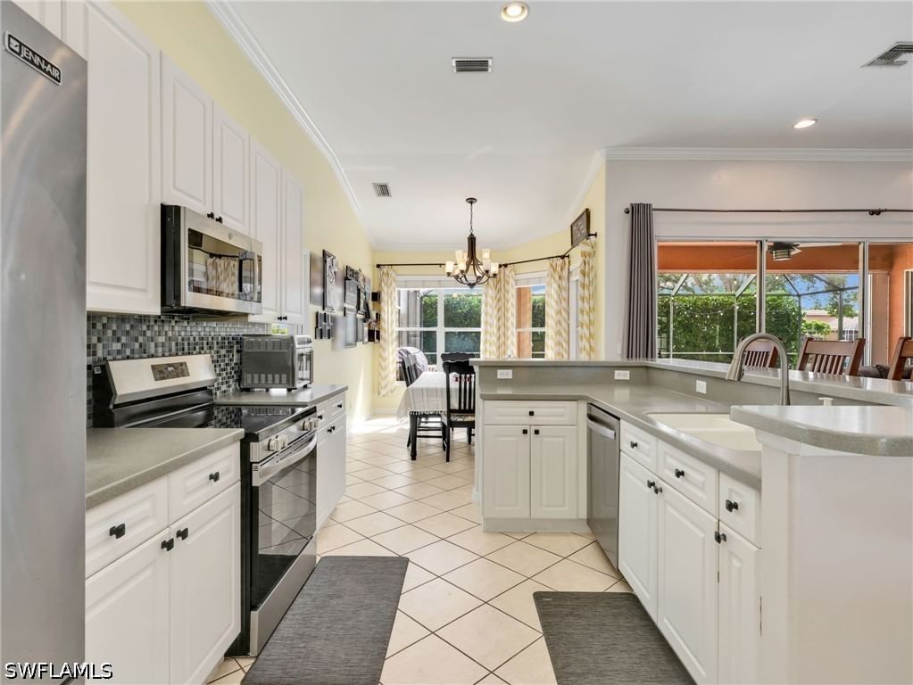 14484 Jekyll Island Court, Naples, FL 34119 photo 5