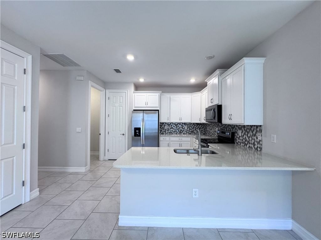 1073 Tranquil Brook Drive, Naples, FL 34114 photo 4