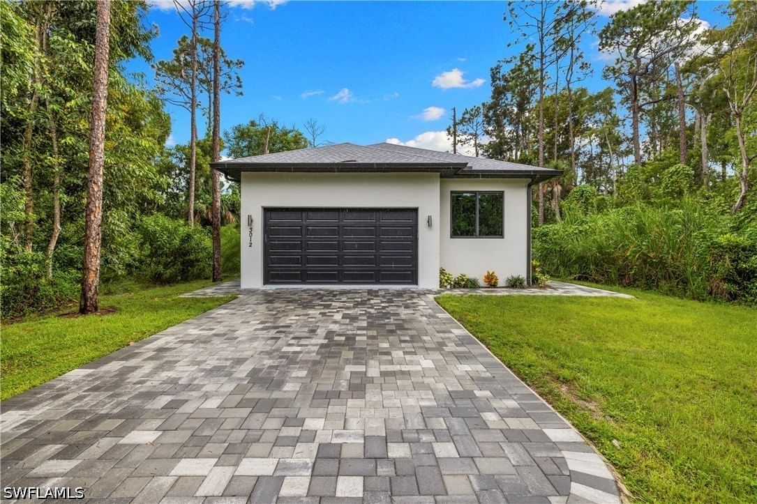 3012 Pine Tree Drive, Naples, FL 34112 photo 2