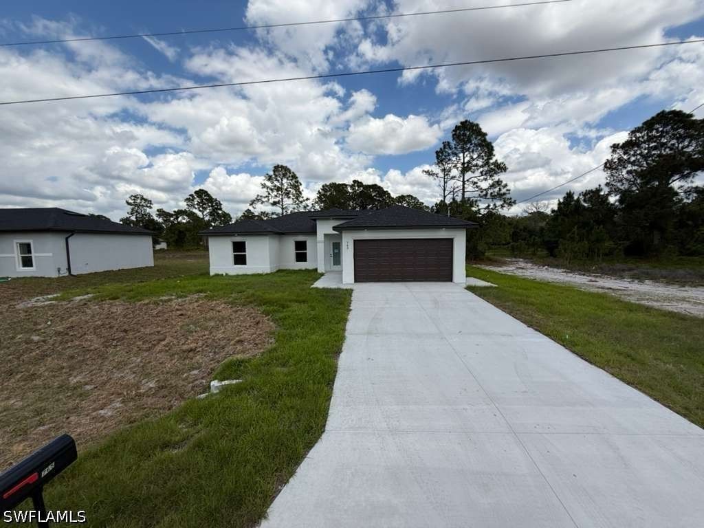 765 Puccini Avenue S, Lehigh Acres, FL 33974 photo 2