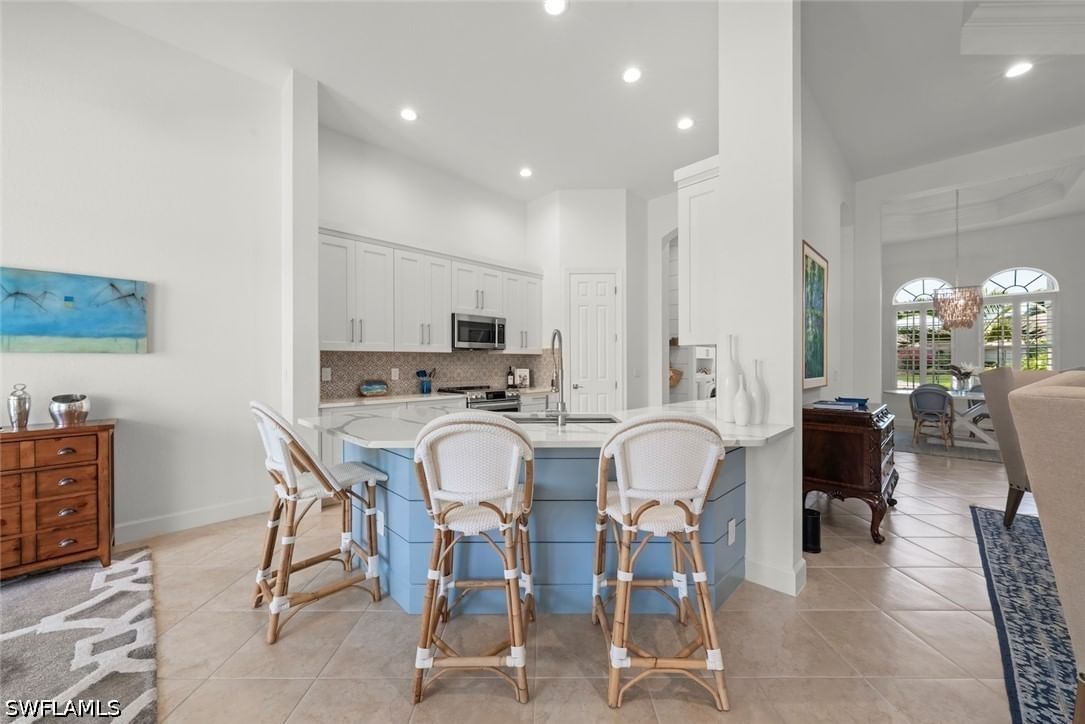 11945 Heather Woods Court, Naples, FL 34120 photo 3