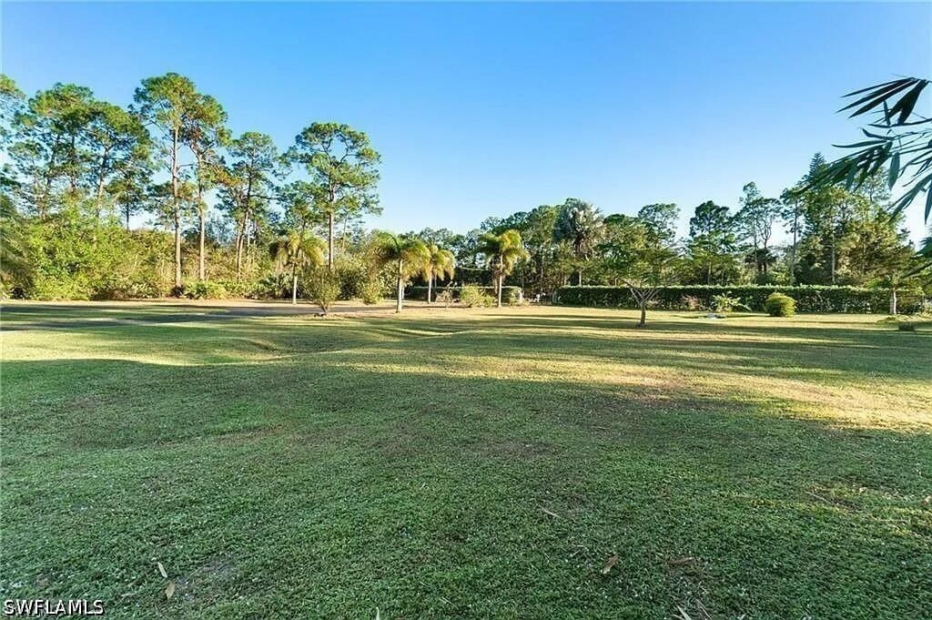 6011 Sea Grass Lane, Naples, FL 34116 photo 3