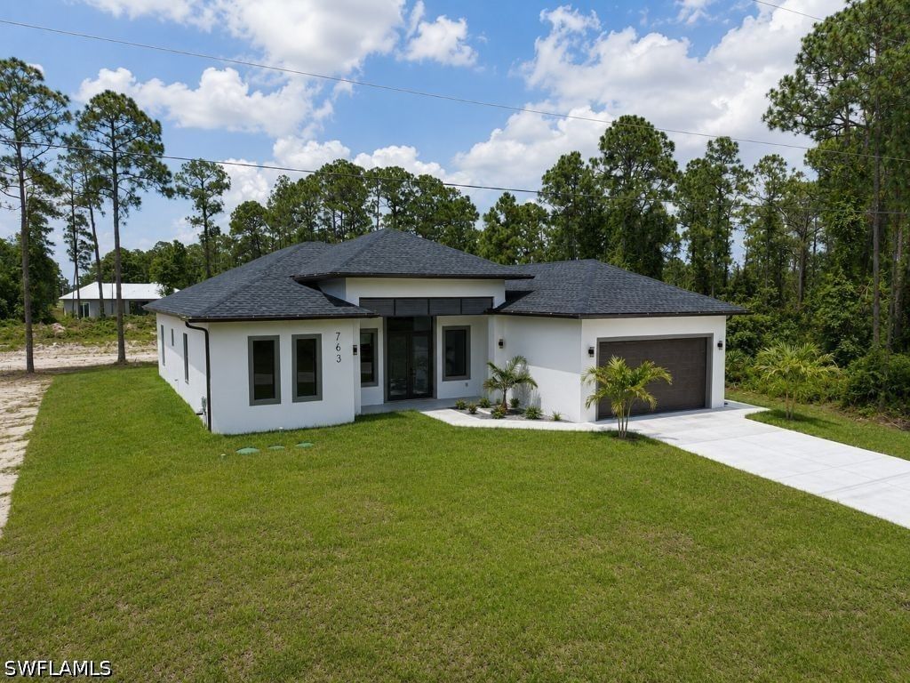 763 Pinecastle Drive, Lehigh Acres, FL 33974 photo 2