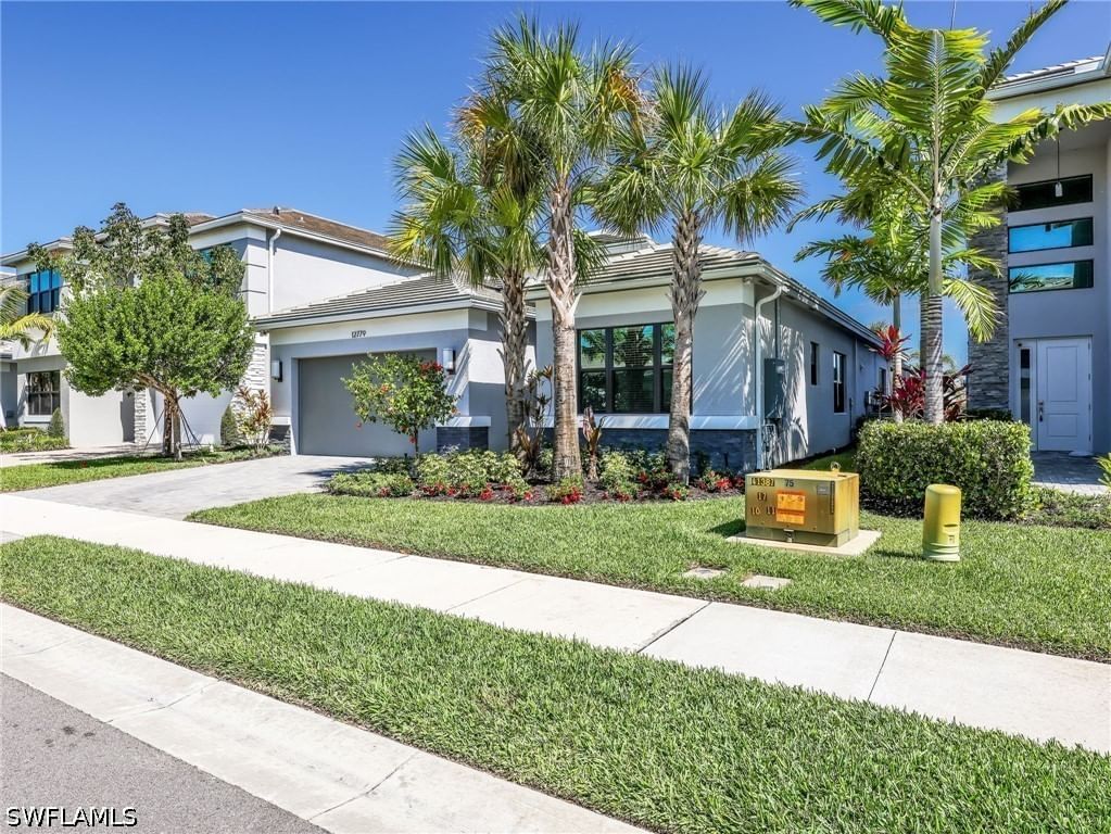 12779 Woodbury Drive, Estero, FL 33928 photo 2