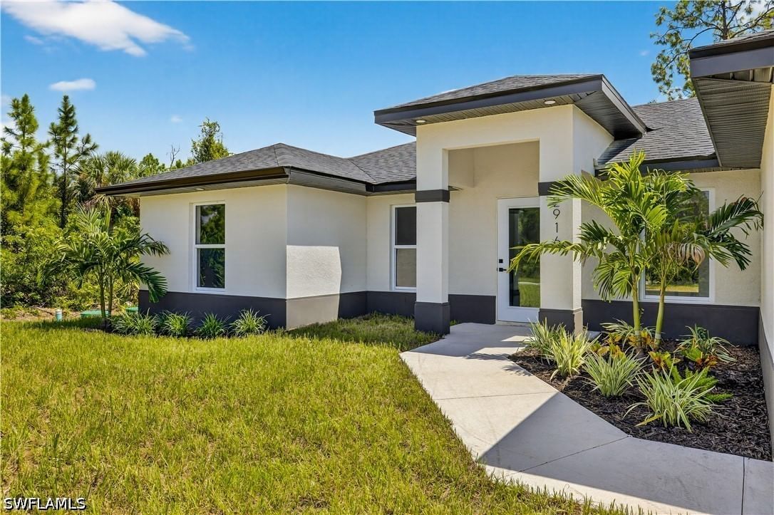 569 Aspen Avenue S, Lehigh Acres, FL 33974 photo 2