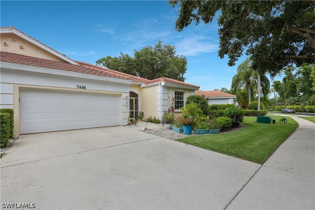 7416 Berkshire Pines Drive, Naples, FL 34104 photo 2