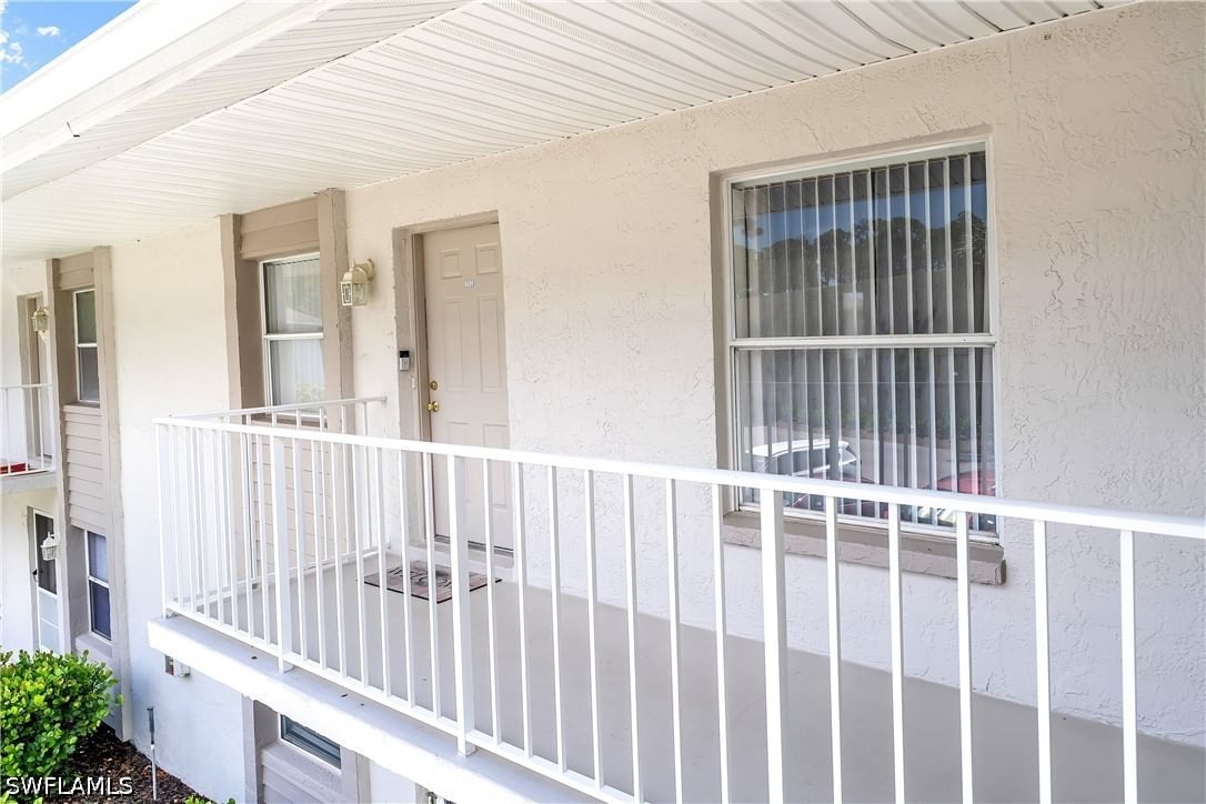 1330 Derbyshire Court #E203, Naples, FL 34116 photo 2