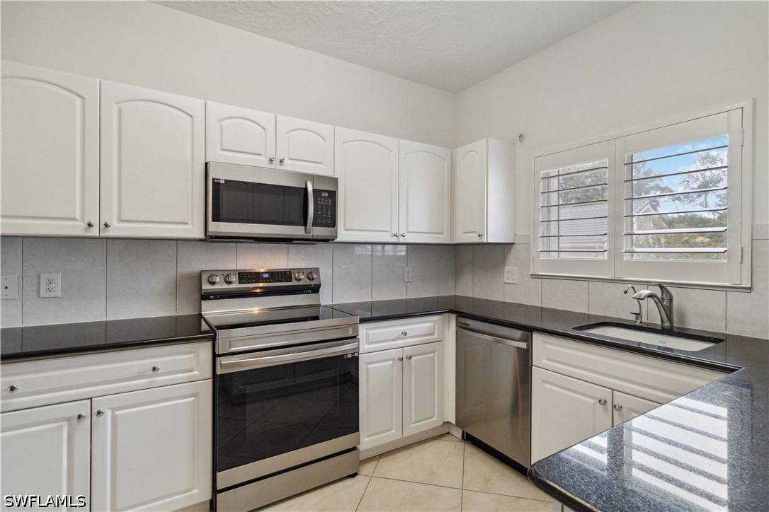 604 Arbor Lake Drive #6-103, Naples, FL 34110 photo 3