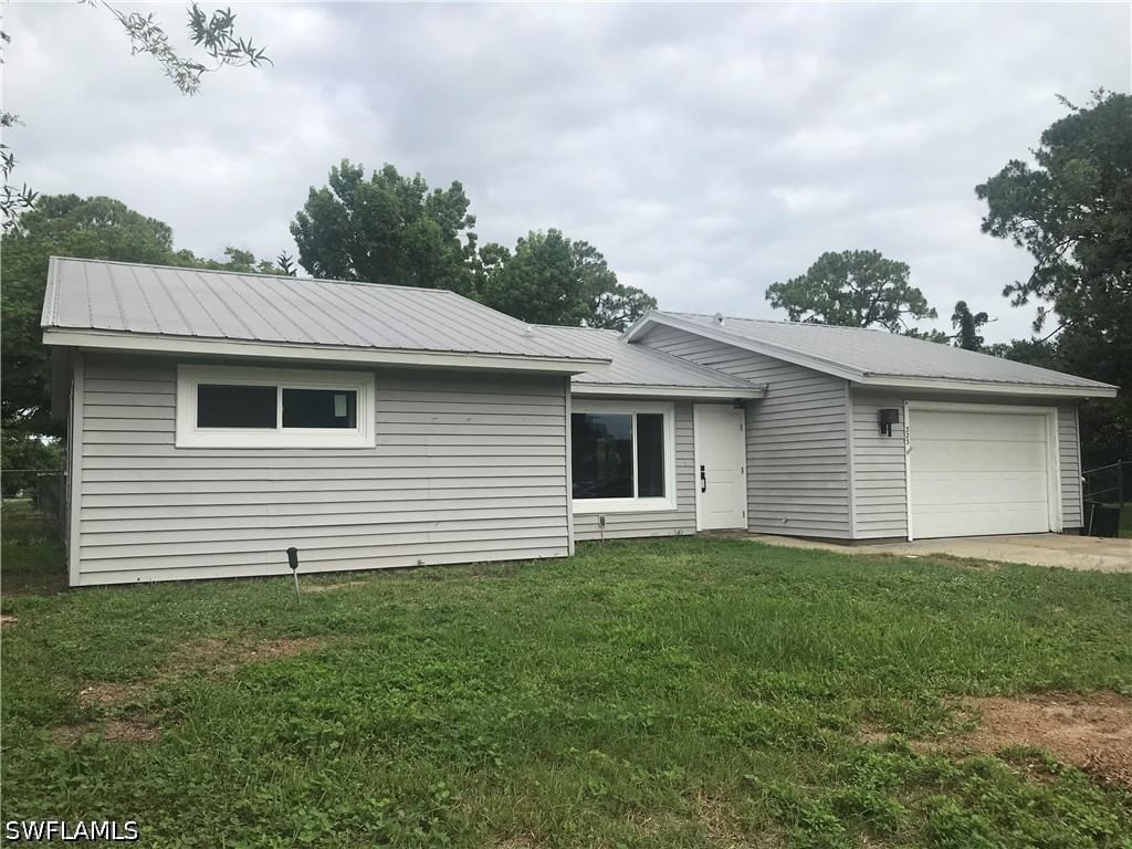 323 Ohio Road, Lehigh Acres, FL 33936 photo 2