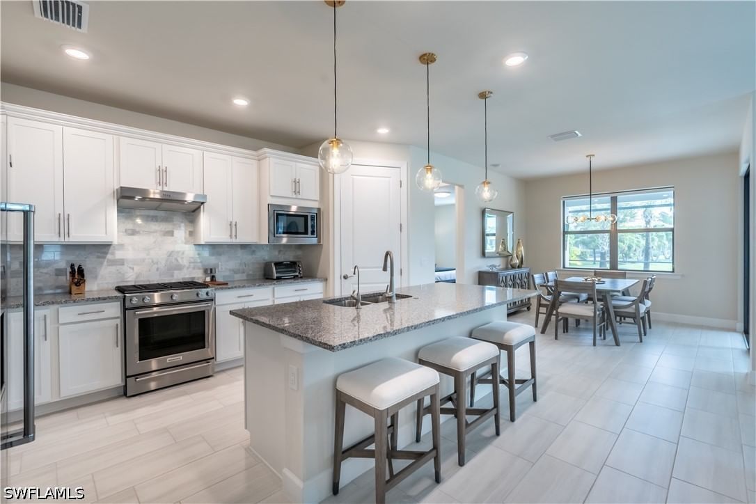 6727 Pennyroyal Drive, Naples, FL 34114 photo 4