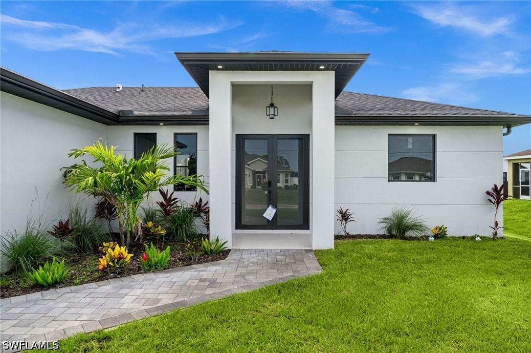 409 NW 25TH Place, Cape Coral, FL 33993 photo 2