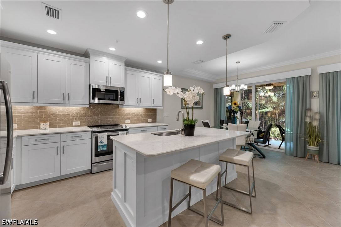 6959 Avalon Circle #1702, Naples, FL 34112 photo 2