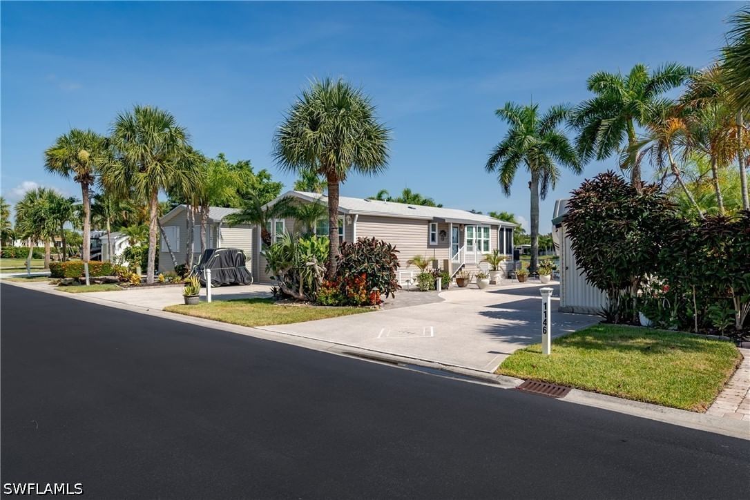 1146 Silver Lakes Boulevard, Naples, FL 34114 photo 2