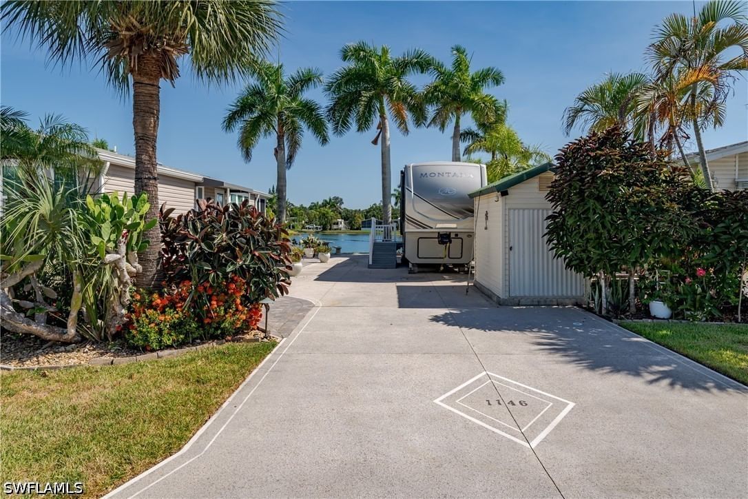 1146 Silver Lakes Boulevard, Naples, FL 34114 photo 4