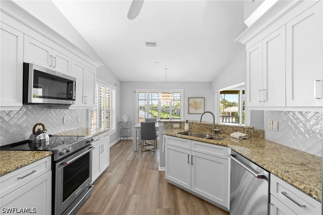 5656 Whisperwood Boulevard #2303, Naples, FL 34110 photo 2