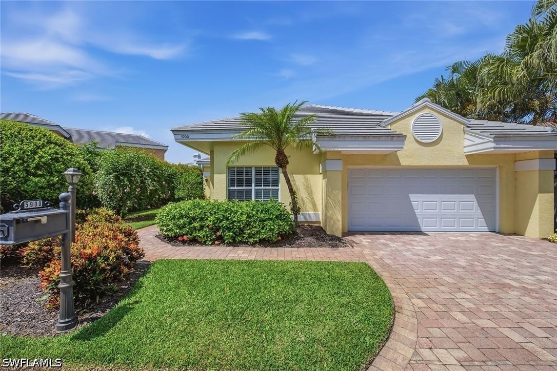 5900 Fountain Drive, Naples, FL 34119 photo 2