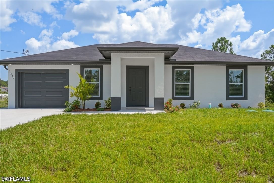1217 Summa Boulevard, Lehigh Acres, FL 33974 photo 2