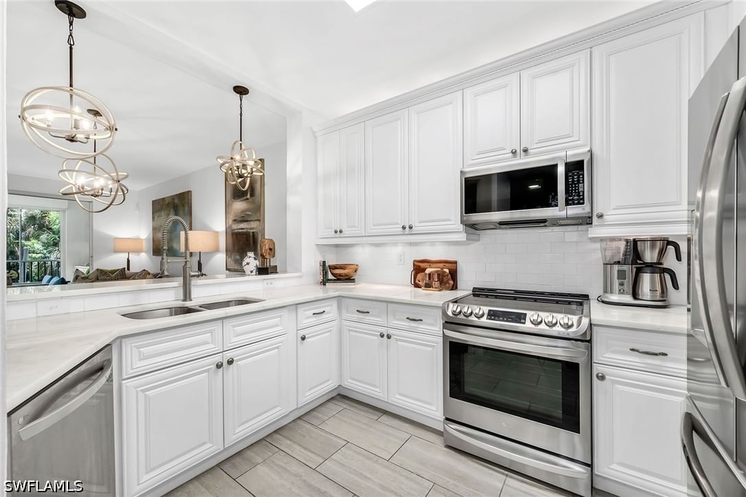 7671 Pebble Creek Circle #105, Naples, FL 34108 photo 2