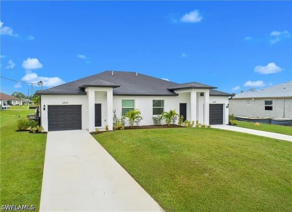 717/719 GORDON Avenue S, Lehigh Acres, FL 33973 photo 3