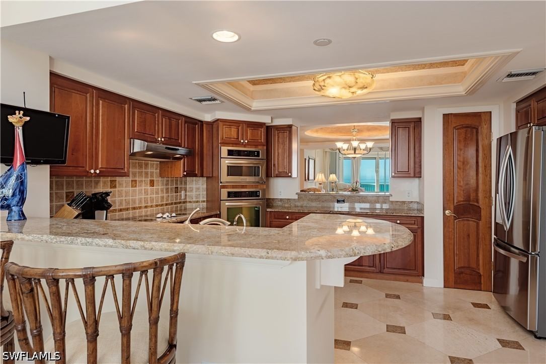 7117 Pelican Bay Boulevard #1905, Naples, FL 34108 photo 4