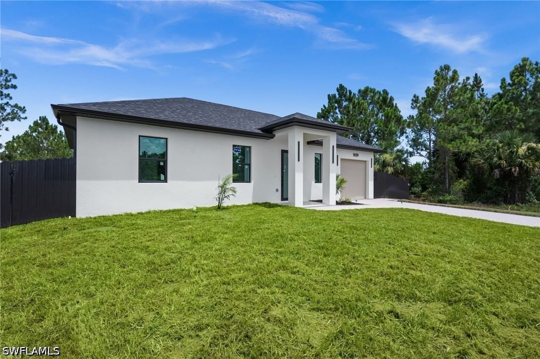 1039 Bassinger Avenue S, Lehigh Acres, FL 33974 photo 4