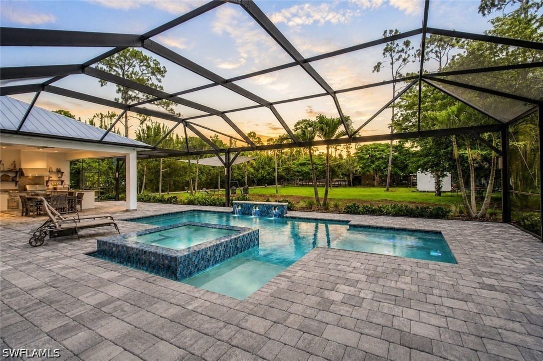 5737 Hidden Oaks Lane, Naples, FL 34119 photo 3