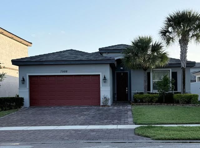 7986 NW Greenbank Circle, Port St Lucie, FL 34987 photo 2