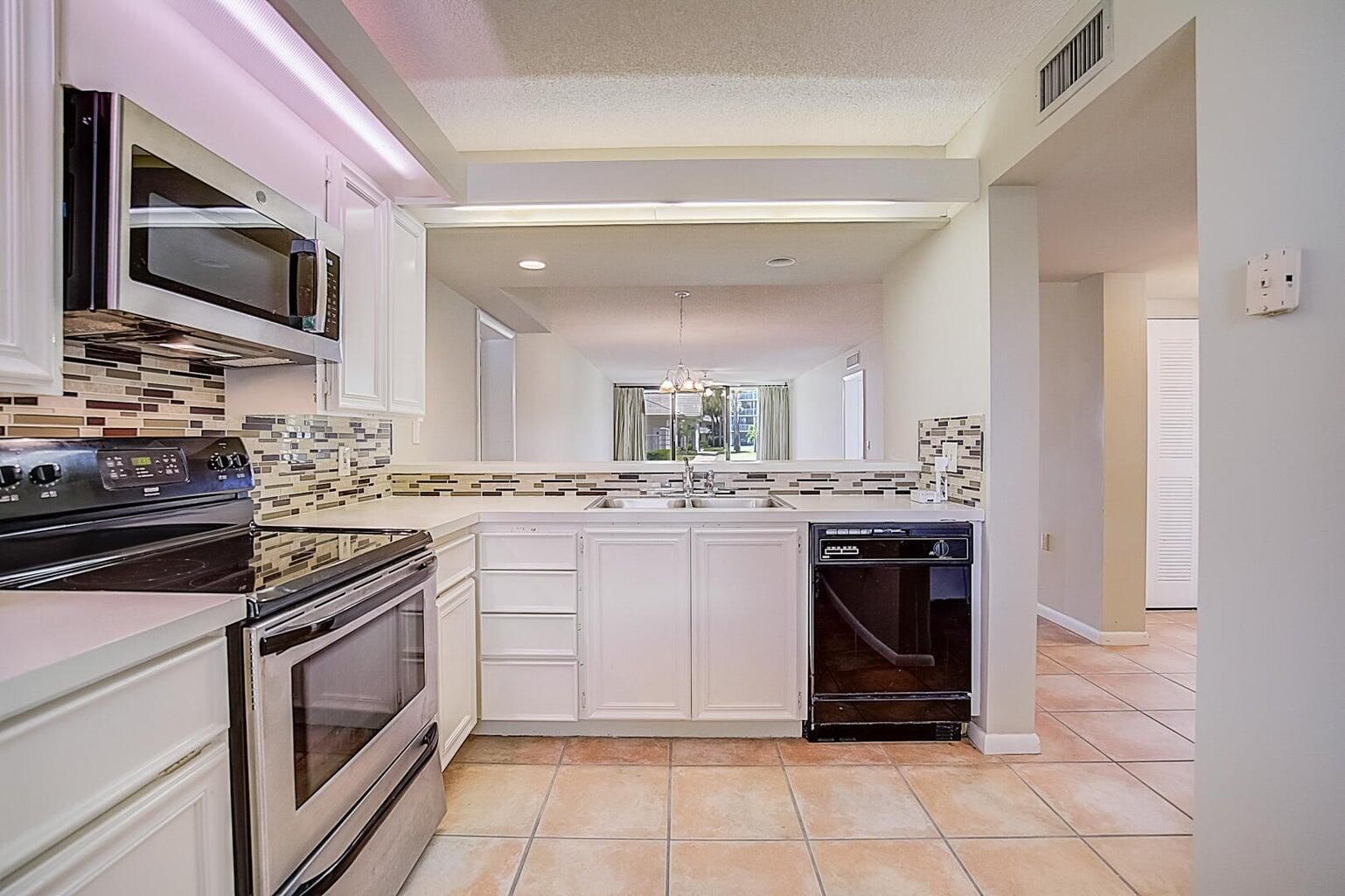 2441 Village Boulevard #102, West Palm Beach, FL 33409 photo 2