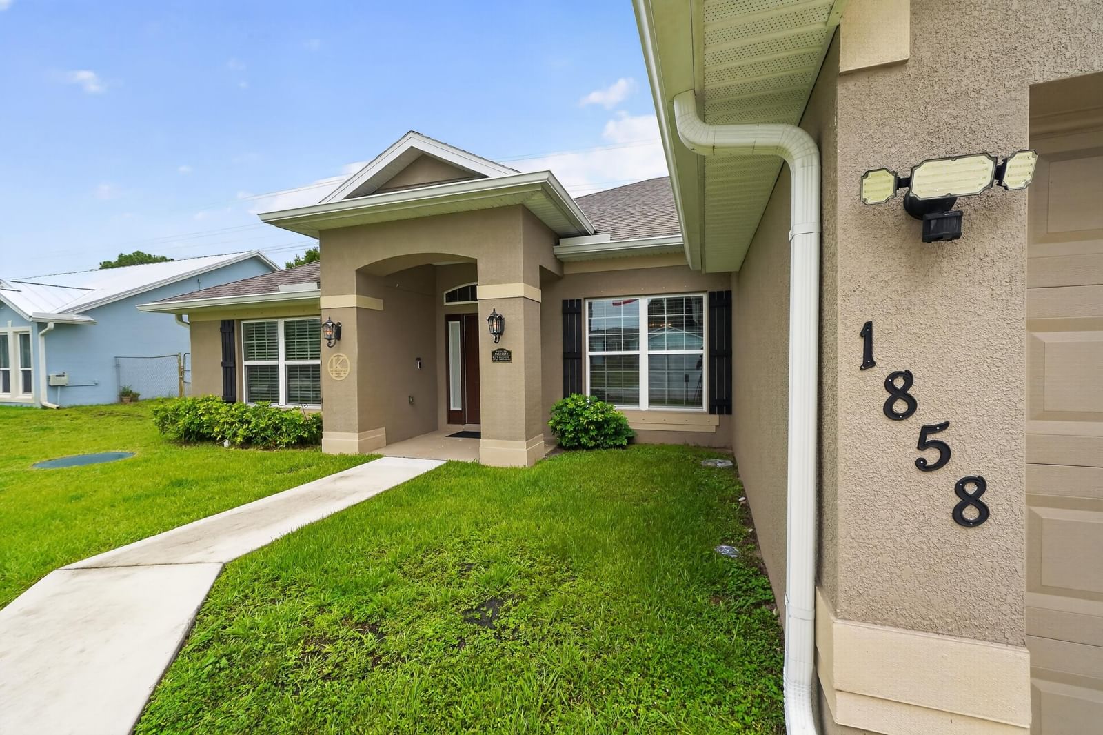 1858 SW Mackenzie Street, Port St Lucie, FL 34953 photo 2